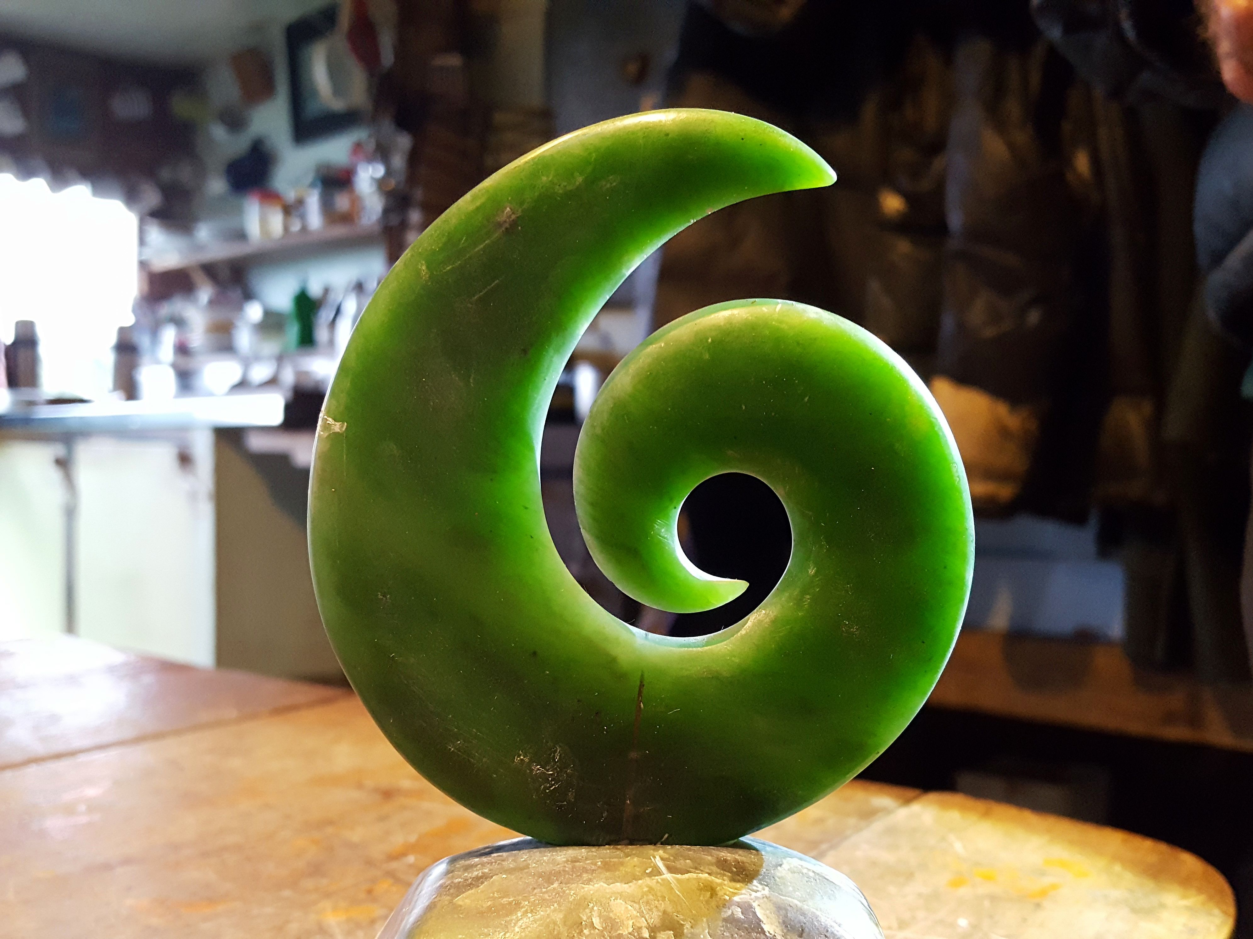 Koru mounted on wood